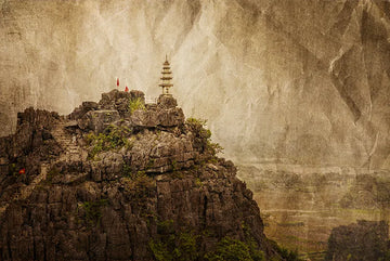 A steep path leading to a pagoda on a mountain ridge, introducing a blog article that reflects on emotional depth and the stories held within a landscape.