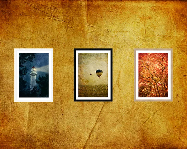 Three framed artworks on a textured yellow wall. Artworks by Andrew Para Photographic Artslider_item_tGjTkz